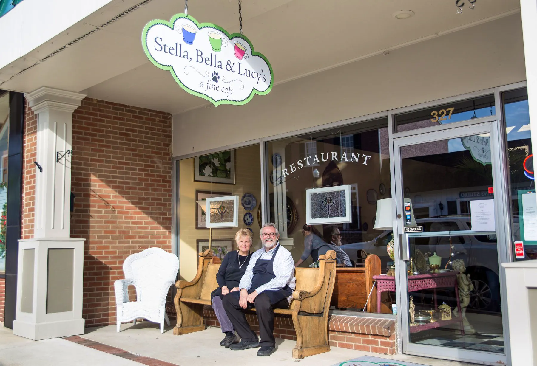The owner's of Stella, Bella, and Lucy's sitting outside their cafe in Downtown Waynesboro, VA.