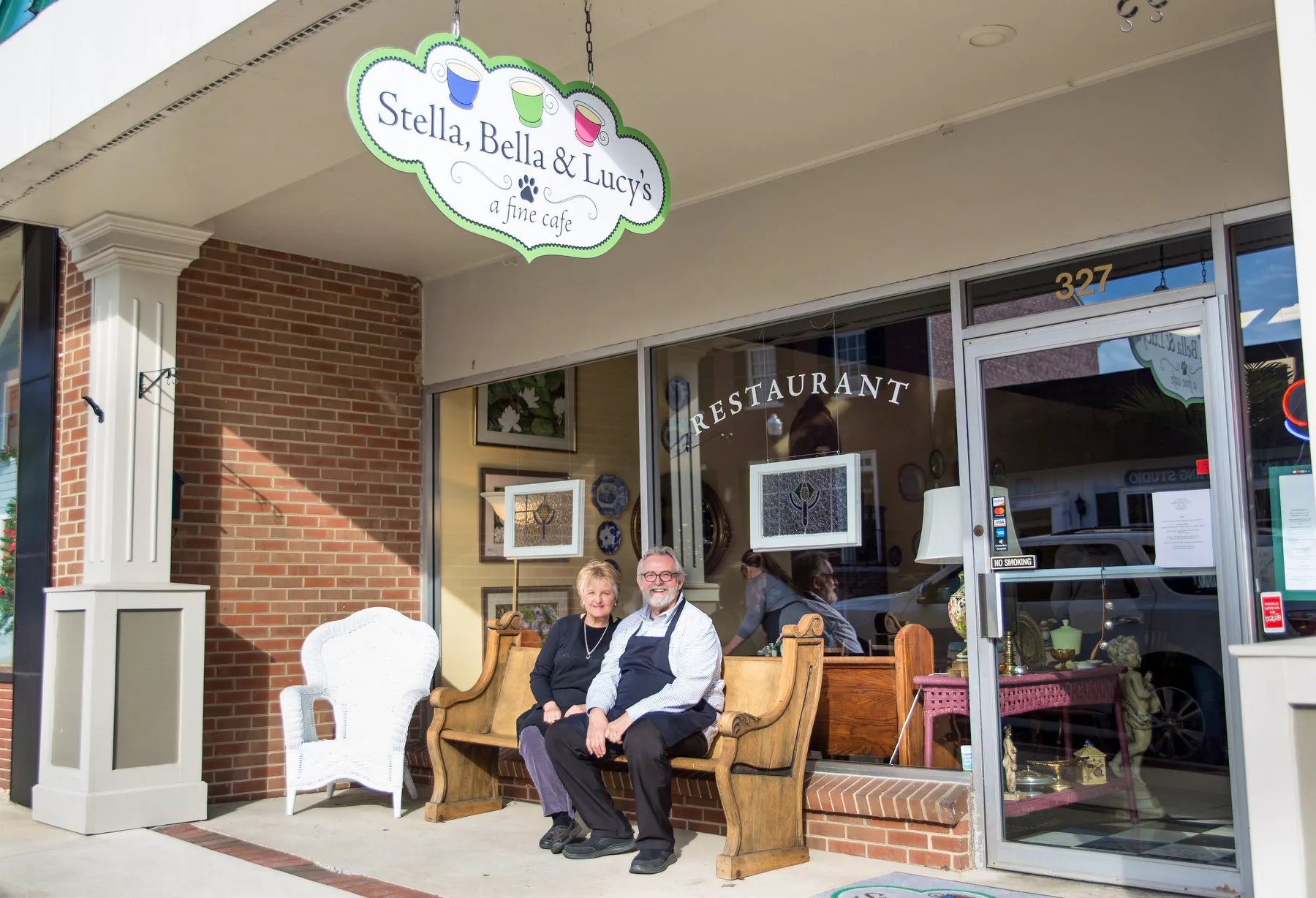 The owner's of Stella, Bella, and Lucy's sitting outside their cafe in Downtown Waynesboro, VA.
